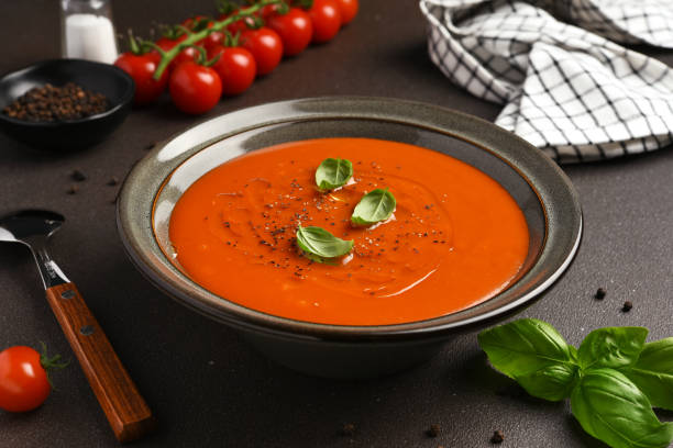 istock Fresh tomato soup Gazpacho with basil on a dark background 2158521707