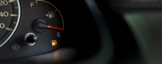 istock Empty fuel warning light in car dashboard. Fuel pump icon. gasoline gauge dash board in car with digital warning sign of run out of fuel turn on. Low level of fuel show on speedometer dashboard. 2158521914