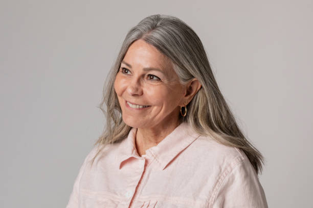 istock Happy senior woman in a studio shoot 2158522116