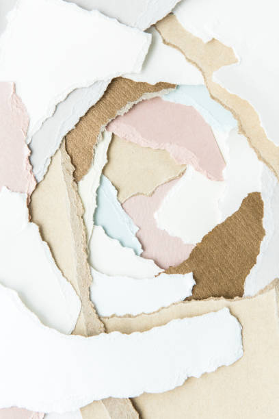 istock Pile of torn pastel papers 2158522208