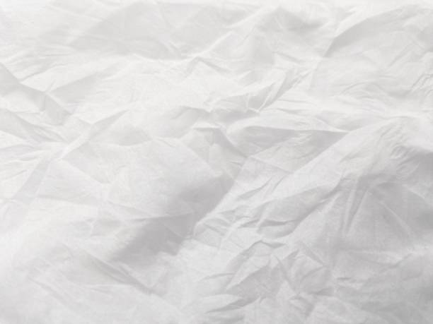istock abstract crumpled white tissue photo background 2158524354