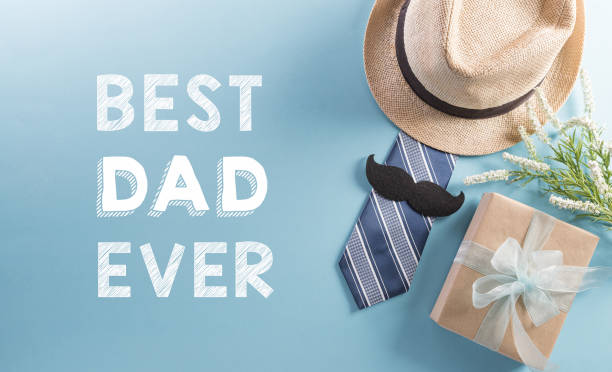 Happy Fathers Day background concept with hat, gift box, necktie and mustache on pastel background.