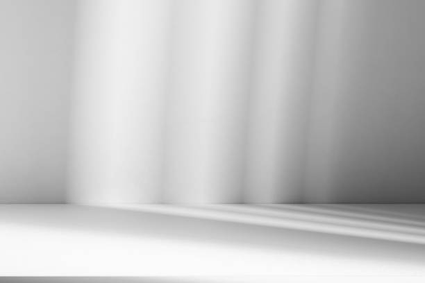 istock Wall interior background, studio and backdrops show products.with shadow from window color white . background for text insertion and presentation product 2158525775