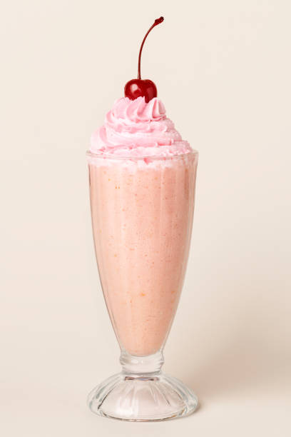 istock Strawberry milkshake with a maraschino cherry on top 2158527451