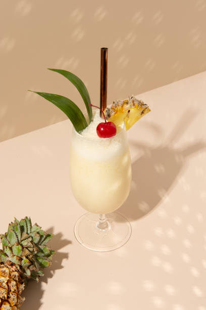 istock Pina Colada with pineapple and cherry on top 2158527622