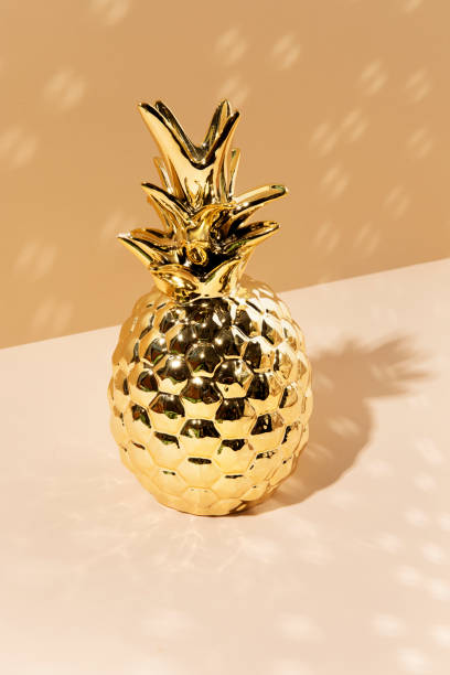 istock Festive golden pineapple interior decor 2158527630