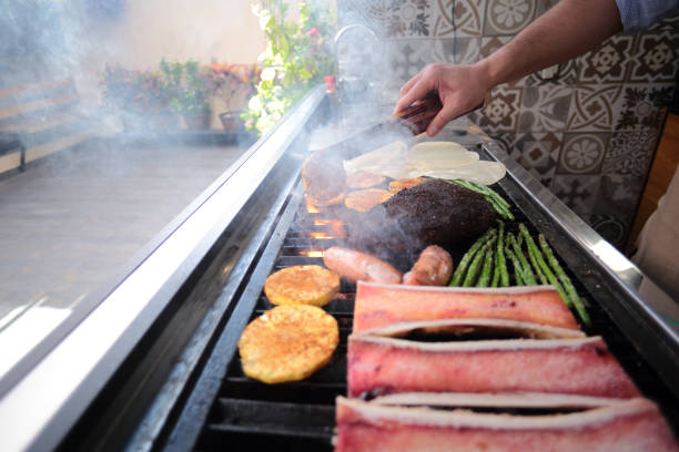 Man cooks mexican food on the grill