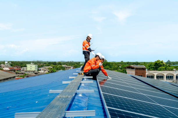 istock Male workers repair Floating solar panels on water lake. Engineers construct on site Floating solar panels at sun light. clean energy for future living. Industrial Renewable energy of green power. 2158534664