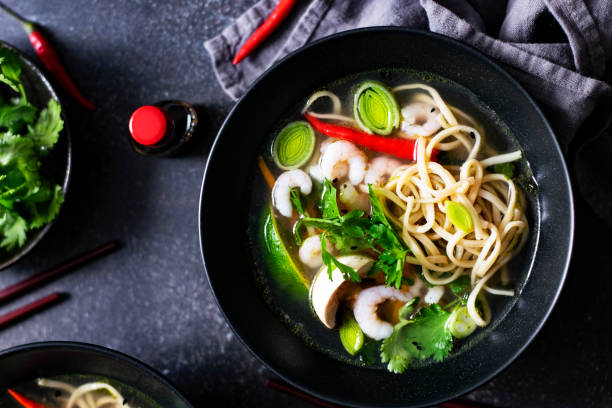 istock Authentic Asian noodle soup in a black bowl 2158536863
