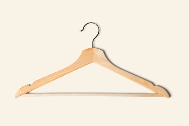istock Light wooden clothes hanger closeup 2158537927