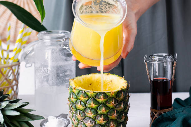 istock Pineapple drink with coconut cranberry syrup step by step 2158538540