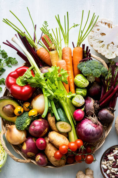 istock Superfood background with colorful vegetables 2158542495