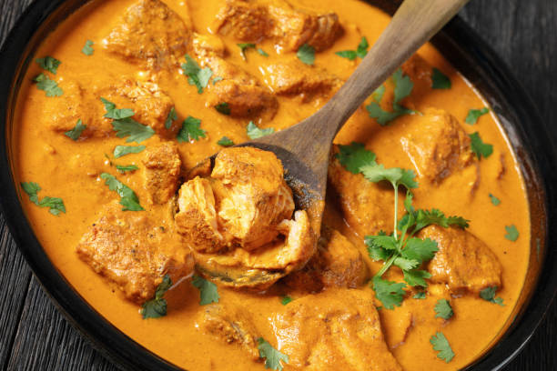 istock indian spiced fish curry, salmon masala, top view 2158542562