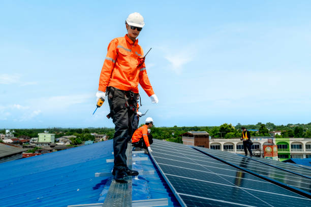 istock engineer man inspects construction of solar cell panel or photovoltaic cell by electronic device. Industrial Renewable energy of green power. factory worker working on tower roof. 2158542880