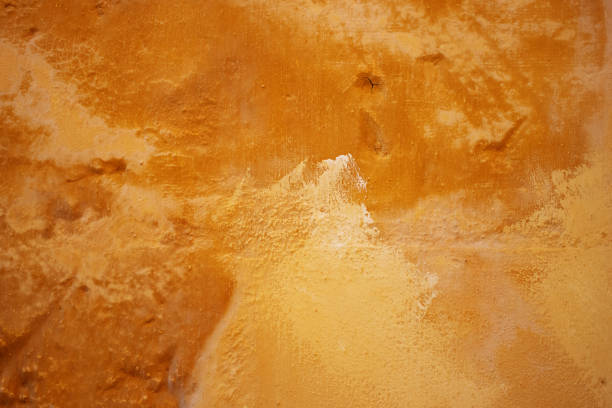 istock detail of stone and cement wall with peeling paint texture 2158542881