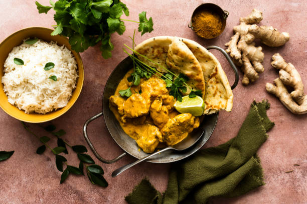 Butter chicken Indian curry in a pan food photography Butter chicken Indian curry in a pan food photography Butter Chicken stock pictures, royalty-free photos & images
