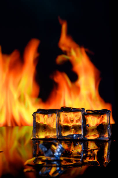 istock ice cubes on fire background for alcoholic cocktail 3 2158543132