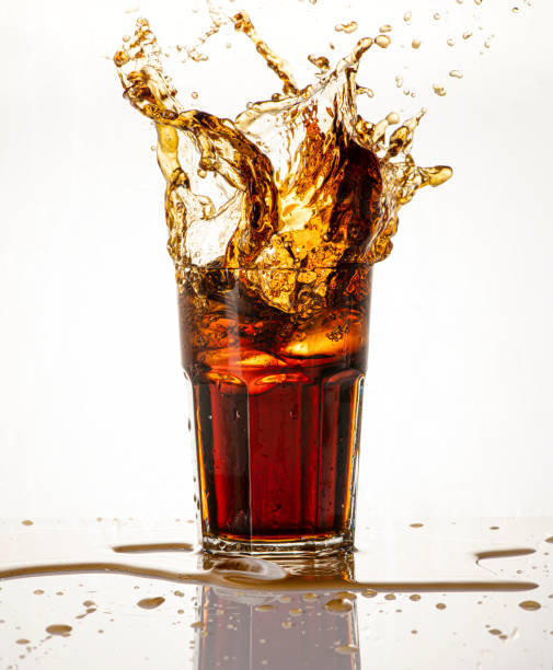 istock Cold carbonated drink splashing over the glass 2158544785