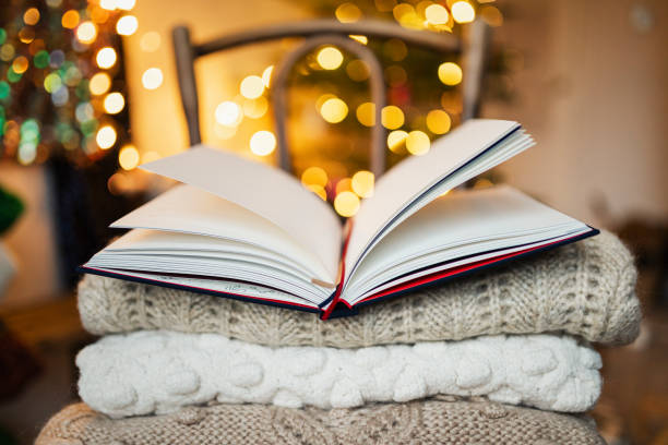 istock Book on top of a sweater 2158545004