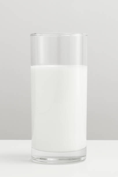 istock Fresh milk in a glass on a table 2158545073