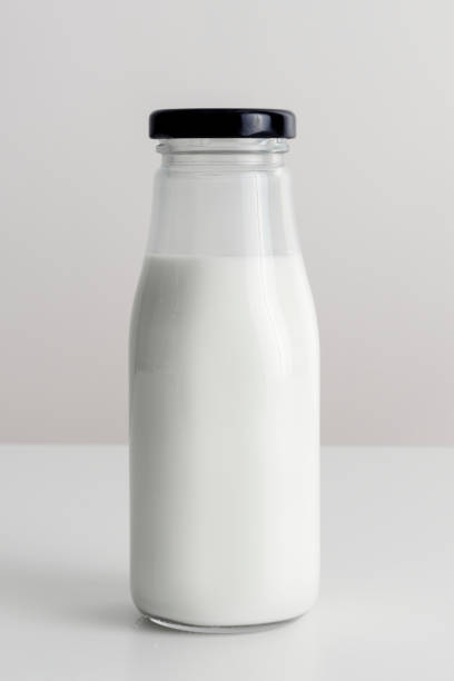 istock Fresh milk in a glass bottle 2158545089