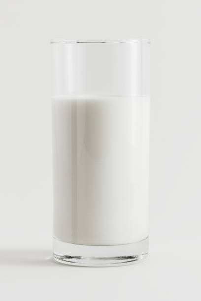 istock Fresh milk in a glass on white background 2158545098
