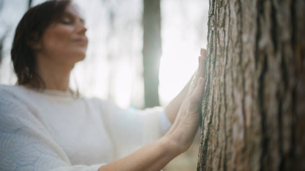 istock Serene Mature Woman Engaging with Nature 2158545595