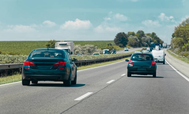 istock Cars driving on busy highway 2158547060