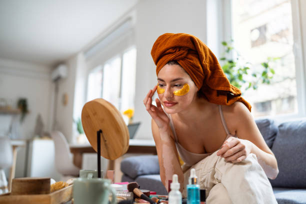Young woman doing her beauty routine at home