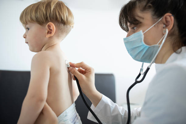 istock Home examination by pediatrician. 2158549677