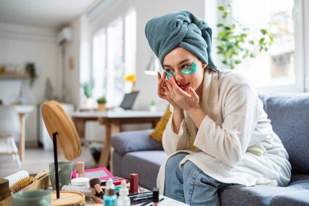 istock Young woman doing her beauty routine at home 2158549955