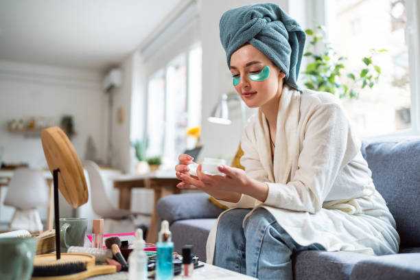 istock Young woman doing her beauty routine at home 2158550675