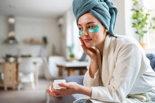 istock Young woman doing her beauty routine at home 2158550693