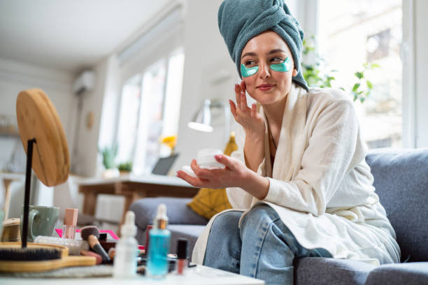 istock Young woman doing her beauty routine at home 2158550715