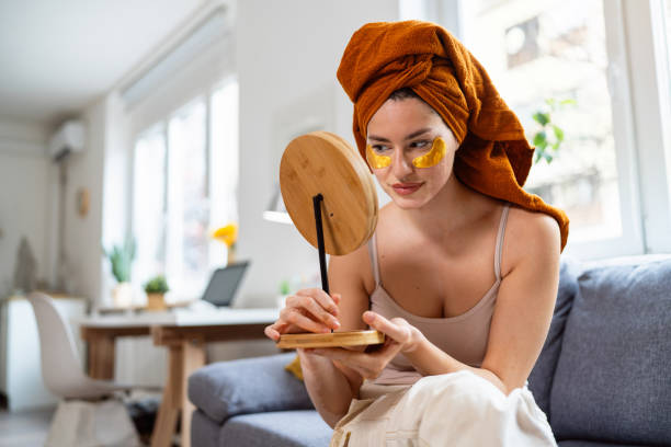 istock Young woman doing her beauty routine at home 2158550895