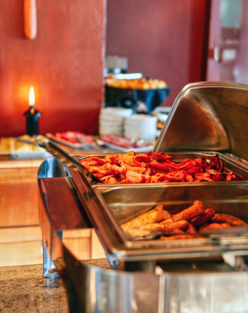 continental breakfast buffet station, sausages and bacon