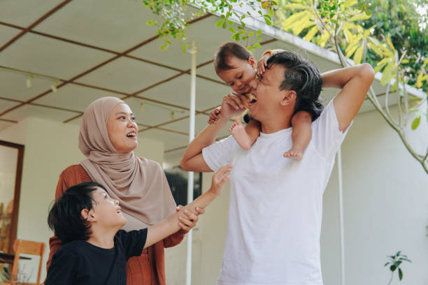 istock Cheerful Asian family doing an outdoor activity enjoying weekend. 2158554498
