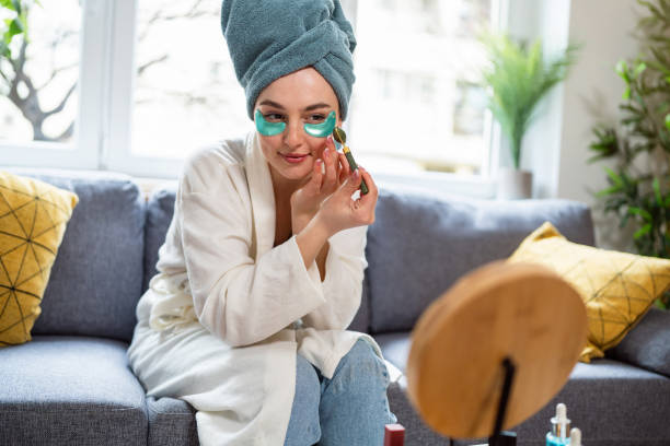 istock Young woman doing her beauty routine at home 2158561867