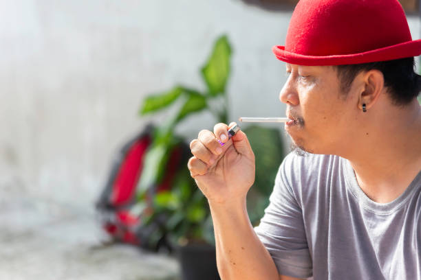 istock Close up man smoking cigarette.healthcare concept. 2158563291