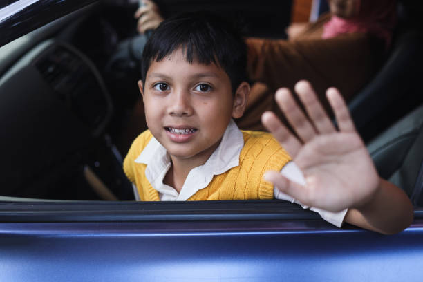 Portrait of a boy in the car