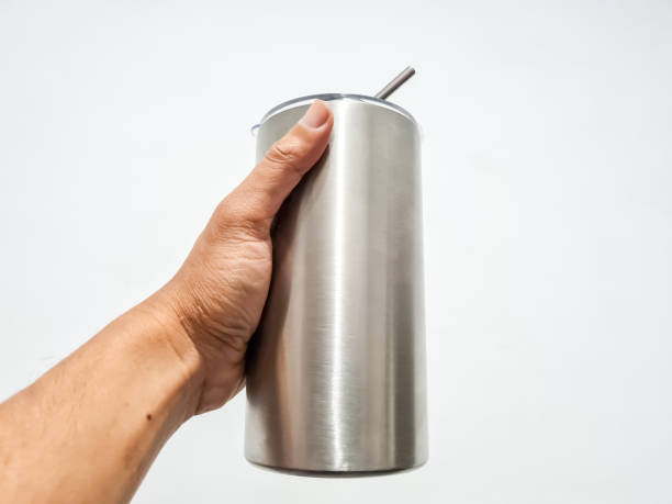 istock Young man's hand holding a drink 2158566605