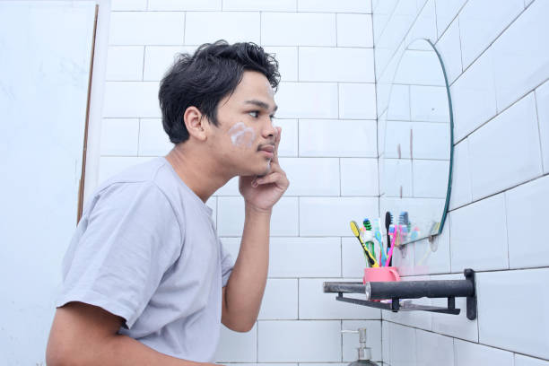 istock Man Skin Care Routine in The Morning 2158568485