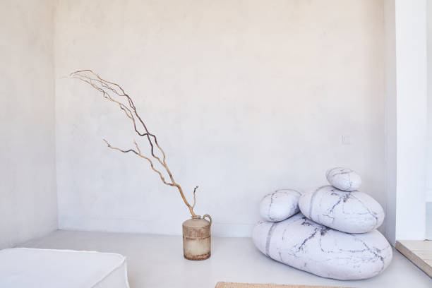 istock Minimal abstract light room with interior items. Decorative stones in a bright interior with space to copy on the wall background 2158569610