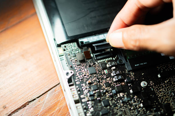 istock Laptop repair and assembly close-up 2158572233