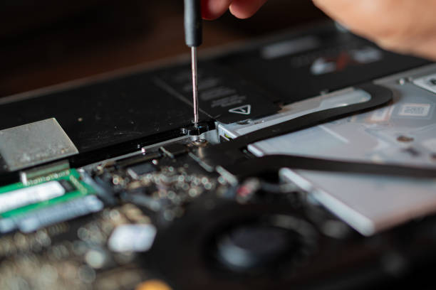 istock Laptop repair with screwdriver 2158572399