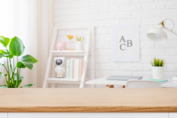 istock Cropped shot of wooden table with copy space in blurred study room 2158573084