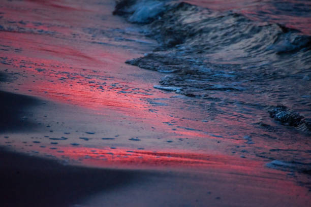 istock Winter deep red-violet sunset by the sea 2158573618