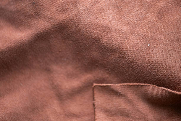 istock Close-up of Brown Fabric with Stitching 2158573994