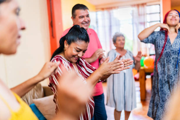 istock Family dancing and celebrating on party at home 2158574376
