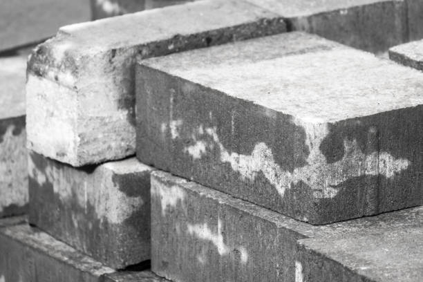 istock Gray paving slabs lay stacked at construction site. Close-up photo 2158576652